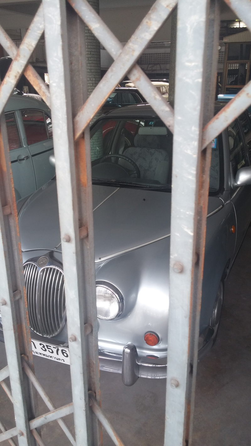 This is no Jaguar - too small. This is a freaking Mitsuoka! Makers of the Orochi, the ugliest car in the world! I think it’s called a Viewt, based on a Nissan March/Micra.